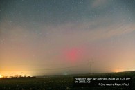 Polarlicht mit hellem Beamer über der Gohrisch Heide